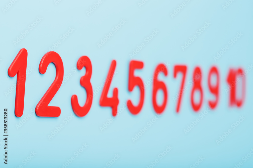 Red numbers on a blue background in a row from one to ten. Red numbers on a blue background in a row from one to ten.