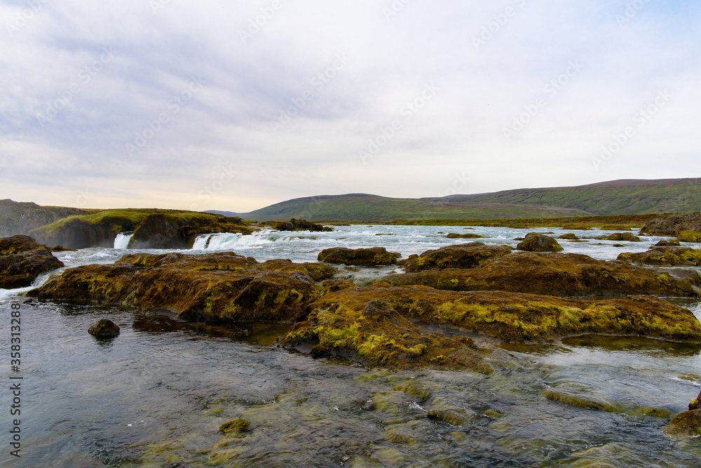 Godafoss (waterfall of the gods) in the Bardardalur district of Northeastern Region of Iceland Godafoss (waterfall of the gods) in the Bardardalur district of Northeastern Region of Iceland