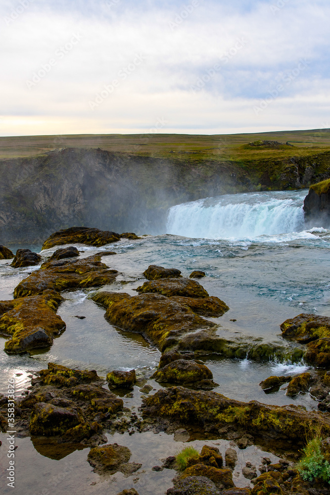Godafoss (waterfall of the gods) in the Bardardalur district of Northeastern Region of Iceland Godafoss (waterfall of the gods) in the Bardardalur district of Northeastern Region of Iceland