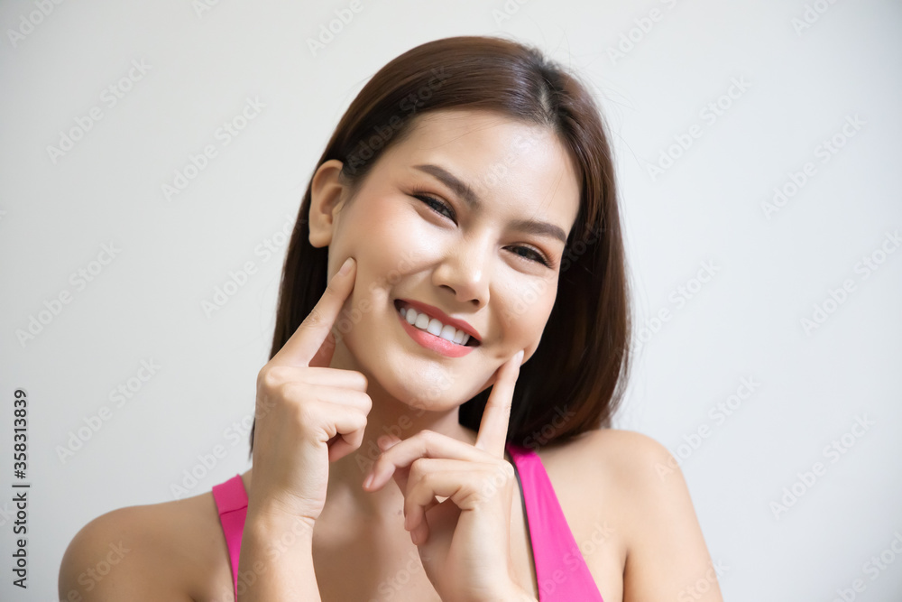 face portrait of happy smiling girl; portrait of positive relaxed happy smiling asian woman smiles on isolated background; young adult southeast asian woman model face portrait of happy smiling girl; portrait of positive relaxed happy smiling asian woman smiles on isolated background; young adult southeast asian woman model
