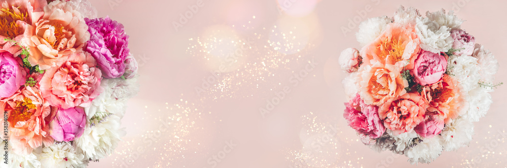 Abundance of Fresh bunch of Peonies Bouquet of different pink colors on light background. Card Concept, copy space for text, banner size Abundance of Fresh bunch of Peonies Bouquet of different pink colors on light background. Card Concept, copy space for text, banner size