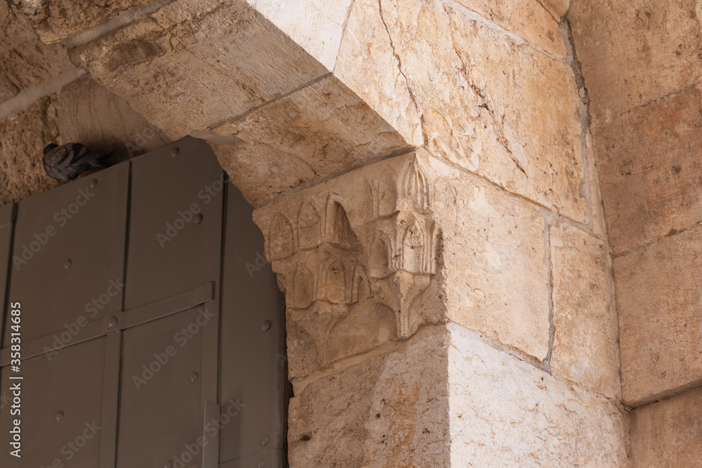 Stone carvings on the wall of the Jaffa Gate in the old city of Jerusalem, Israel