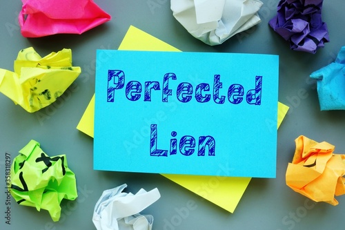 Business concept meaning Perfected Lien with inscription on the piece of paper.