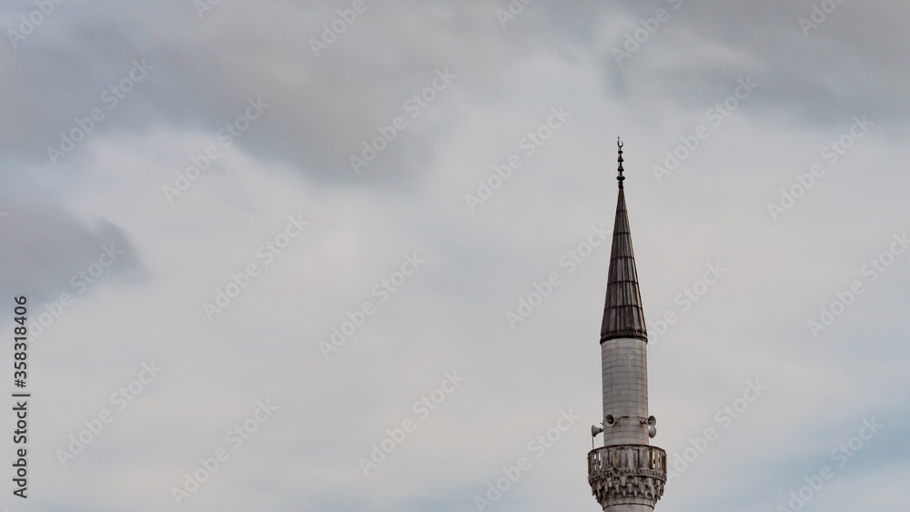 Time lapse of minaret with clouds in Turkey. 4K UHD 24 fps