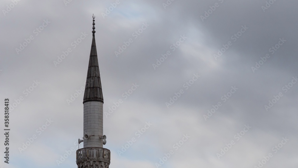 Time lapse of minaret with clouds in Turkey. 4K UHD 29.97 fps.