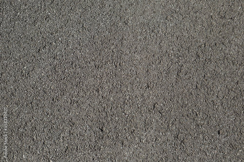 Background of gray asphalt. Pavement texture