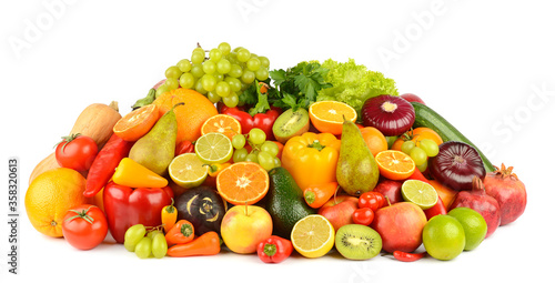 Collection of multi-colored bright fruits and vegetables isolated on white
