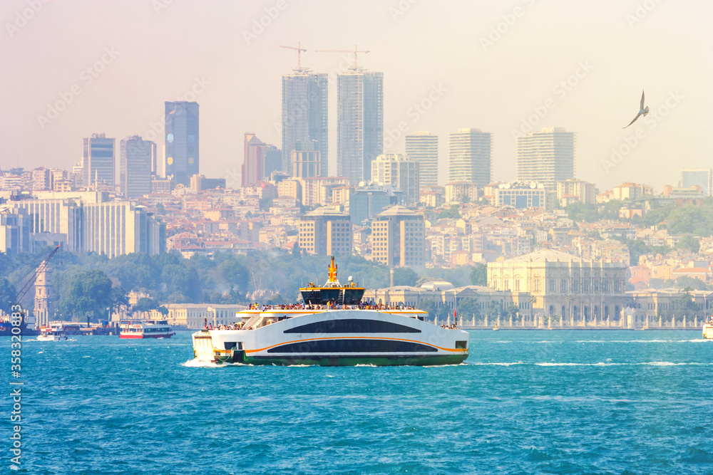 Summer city landscape - view of the Bosphorus and the historic district of Besiktas, Istanbul, in Turkey