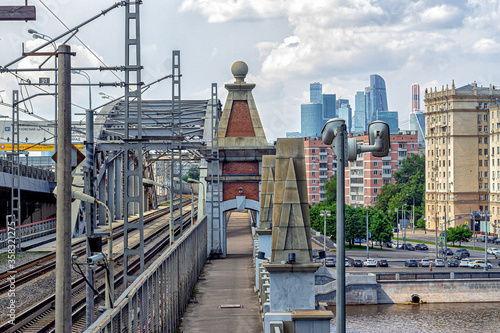 Industrial urban landscape with railway bridge, residential buildings and skyscrapers «Moscow City»