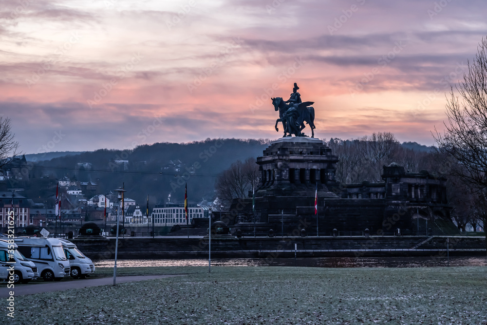 Colorful Sunrise burning sky Koblenz City historic monument German Corner where river rhine and mosele flow together