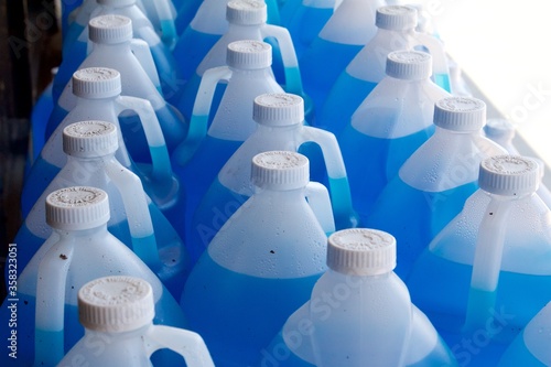 Gallon size jugs of windshield washer fluid sold at a truck stop during.a summer heat wave in central Pennsylvania.