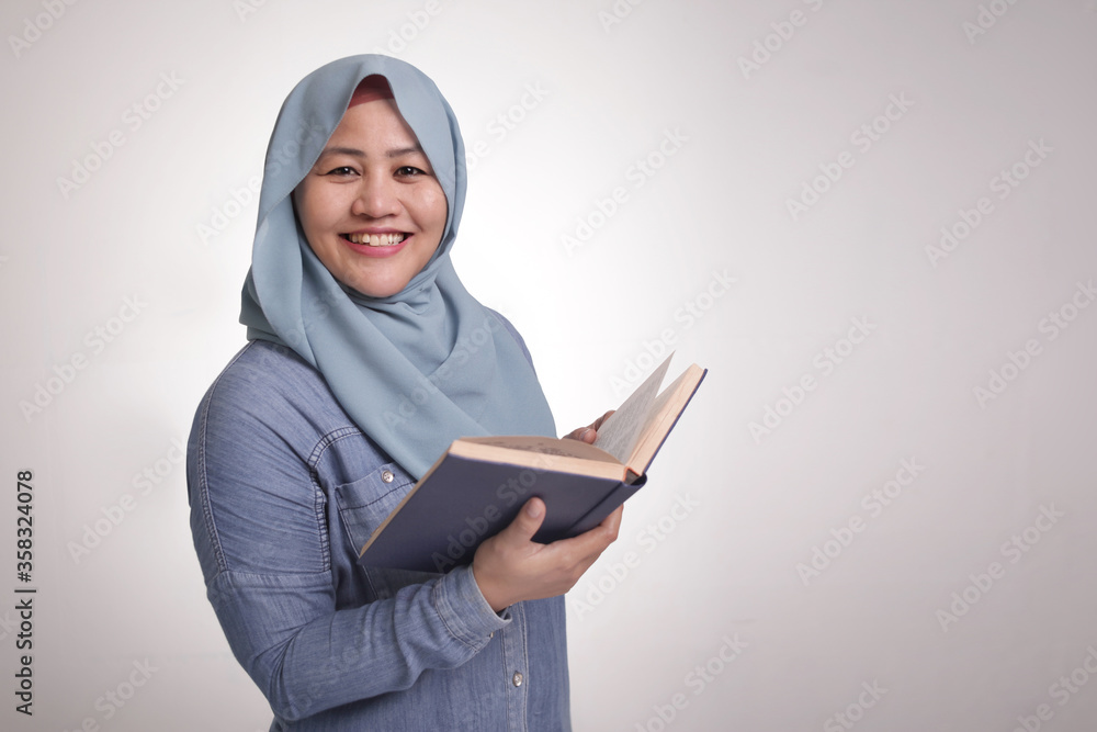 Muslim Woman Reading Book, Smiling Muslim Woman Reading Book, Smiling