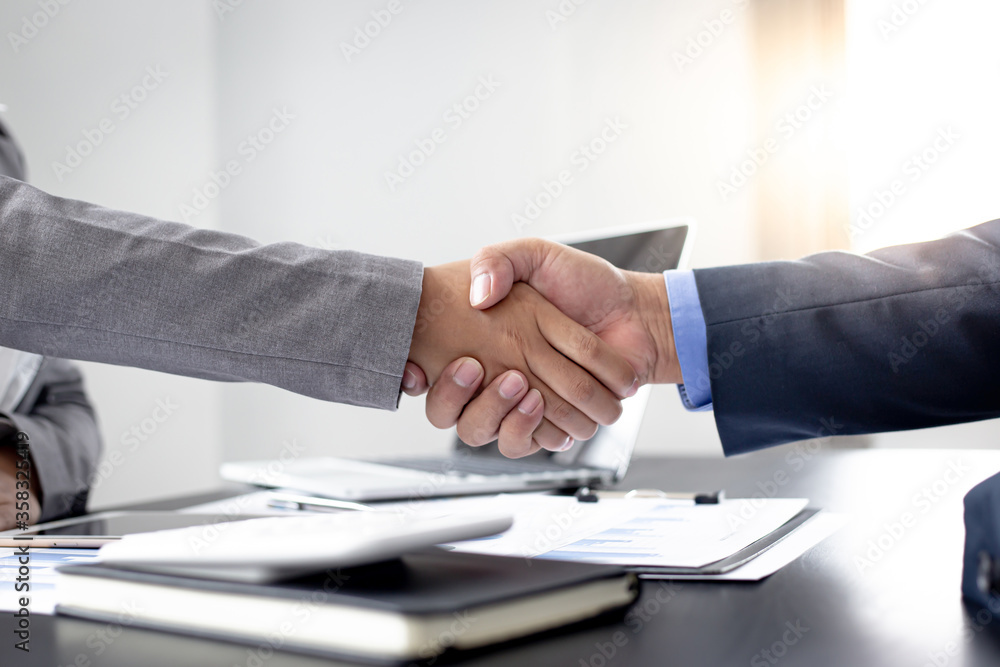 custom made wallpaper toronto digitalBoth businessmen shake hands to congratulate the office of the meeting.