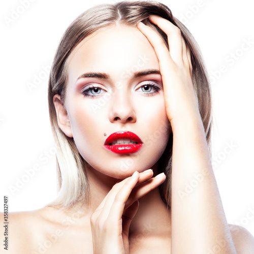 Beauty fashion portrait of caucasian blonde woman face brigh make-up red lipstick and healthy skin