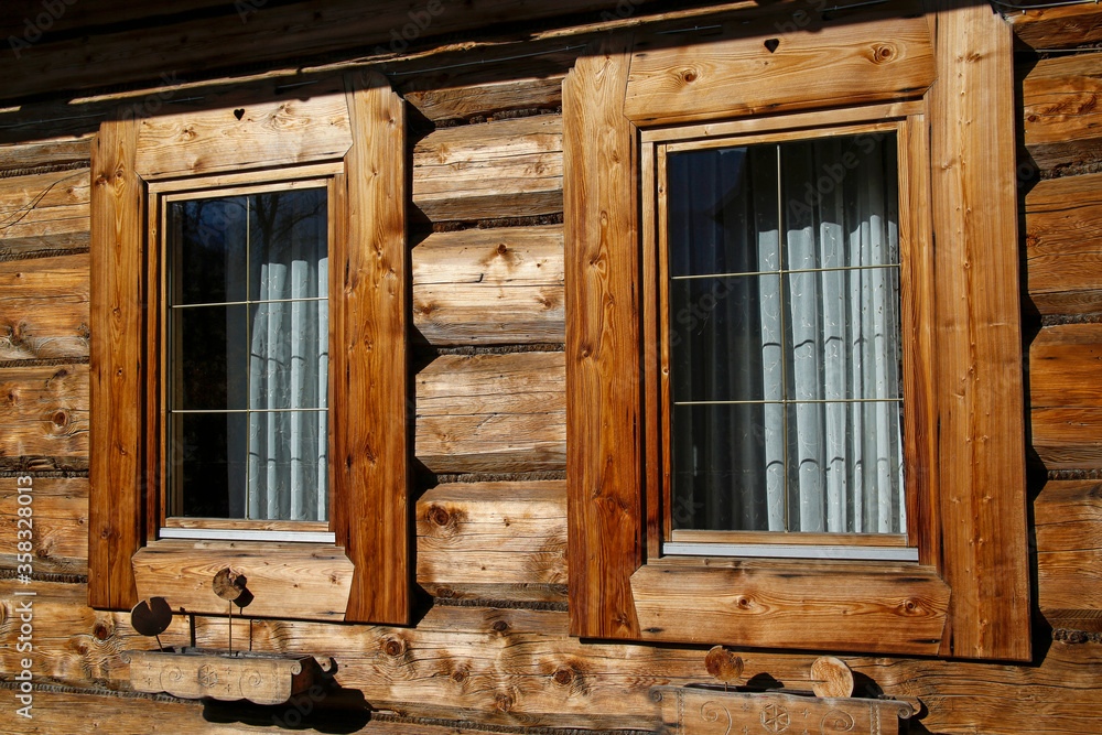 two windows of countryside wooden house two windows of countryside wooden house