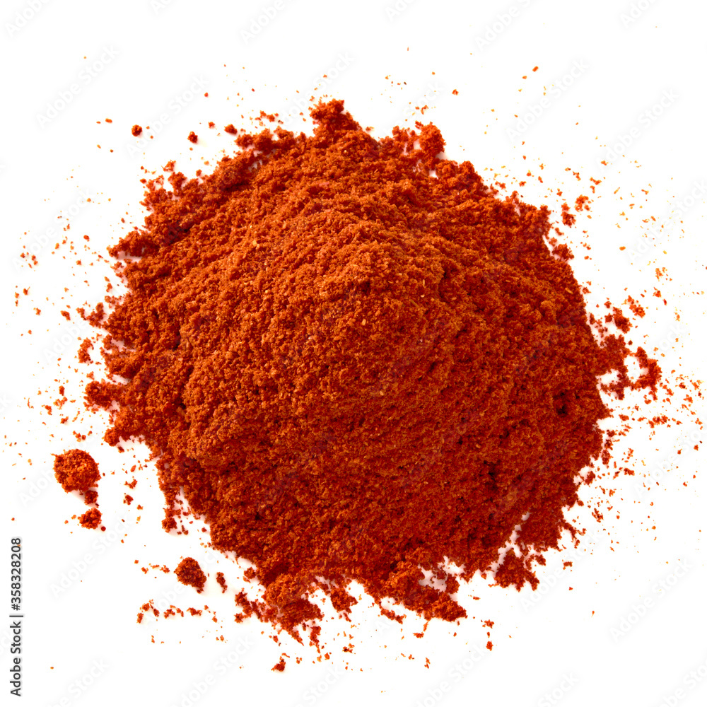 Red hot chili powder from top view isolated on white background. Red hot chili powder from top view isolated on white background.