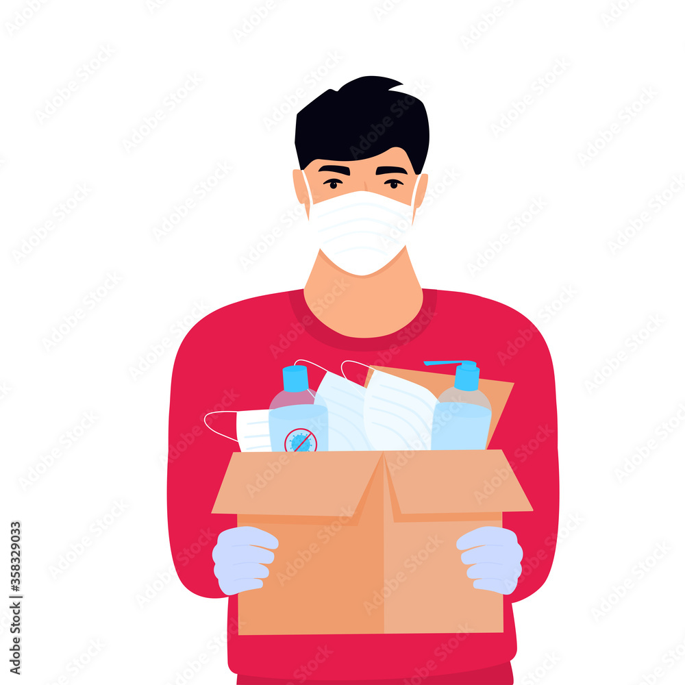 COVID-19. Humanitarian aid. Supply of medical protective masks and disinfectants. Coronavirus epidemic. Delivery man delivering parcel COVID-19. Humanitarian aid. Supply of medical protective masks and disinfectants. Coronavirus epidemic. Delivery man delivering parcel