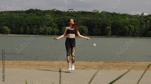 Young woman jumping in the park