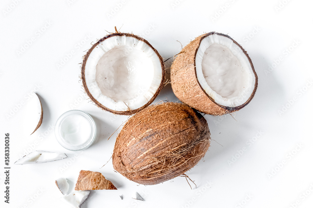organic cosmetics with coconut on white background top view organic cosmetics with coconut on white background top view