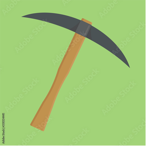 A metal pickaxe with a wooden handle for working in a mine