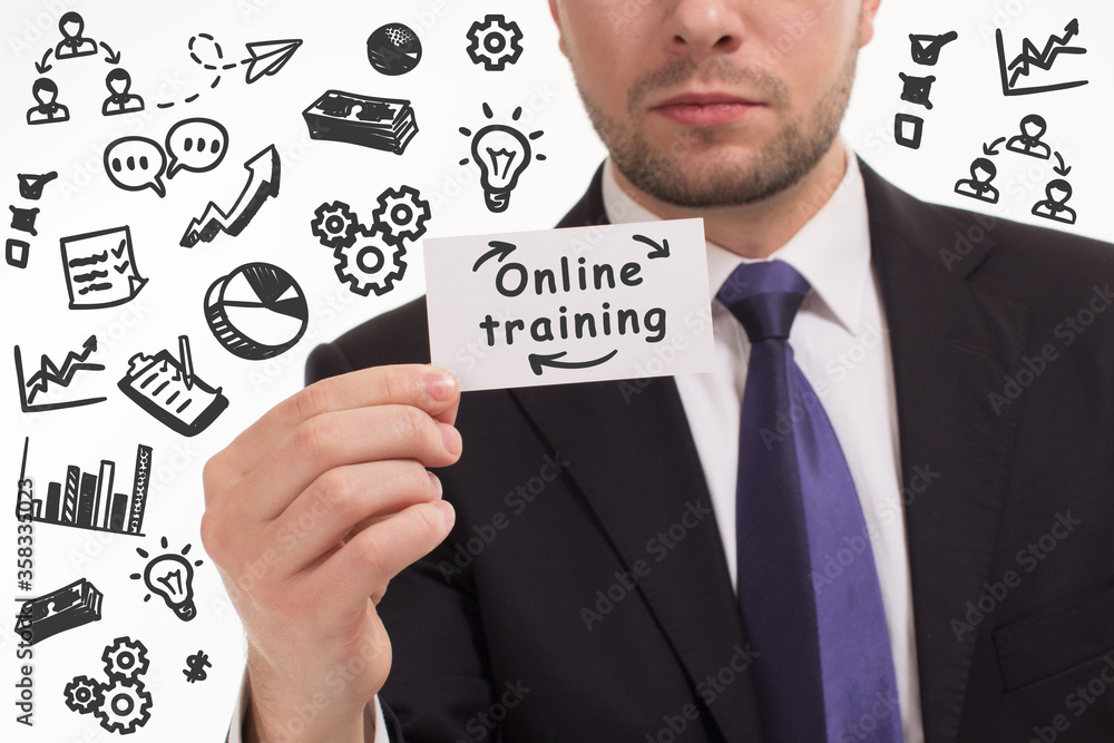 Business, technology, internet and network concept. Young businessman thinks over the steps for successful growth: Online training Business, technology, internet and network concept. Young businessman thinks over the steps for successful growth: Online training