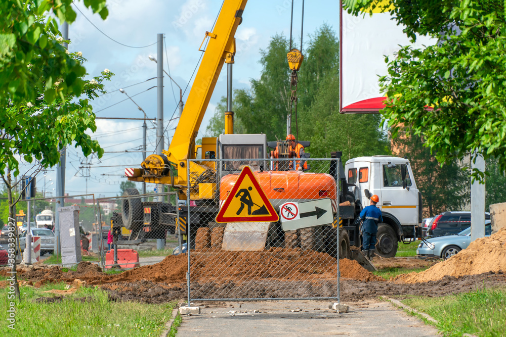 repair-work-on-sidewalks-in-the-city-on-a-sunny-bright-summer-day