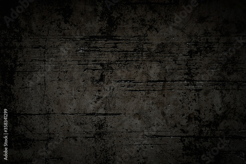 Black rough concrete wall or floor texture background.