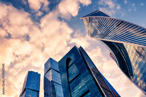 Photography Modern glass skyscrapers against the sky at sunset