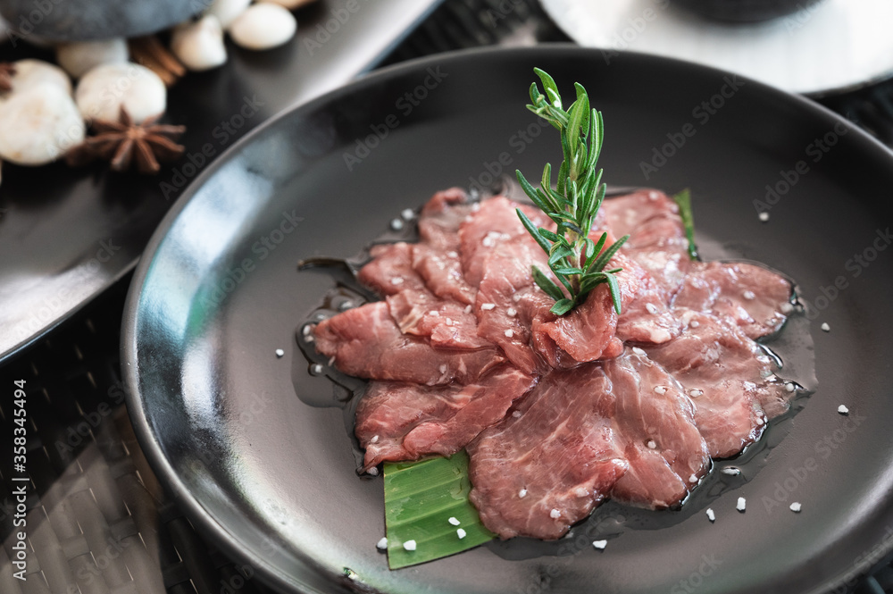 Sliced juicy raw lamb meat, cooking ingredient. preparing for grill