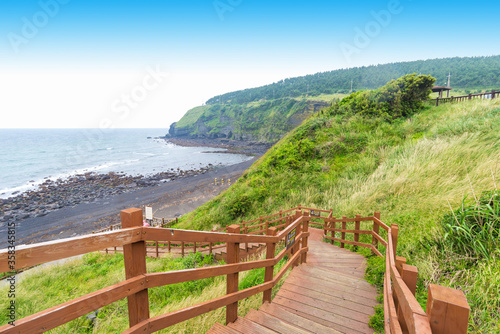 Wooden path to the Rocky Beach at Peninsula Daejeong Eup photo