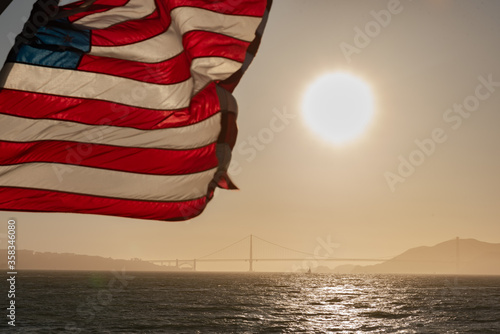 American Flag waving in front of beautiful scenery