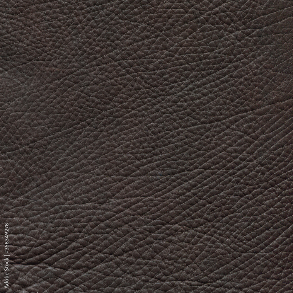 Brown leather texture closeup background. Brown leather texture closeup background.