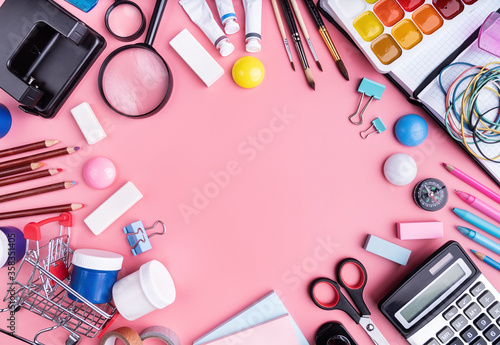 School supplies on pink background top view flat lay