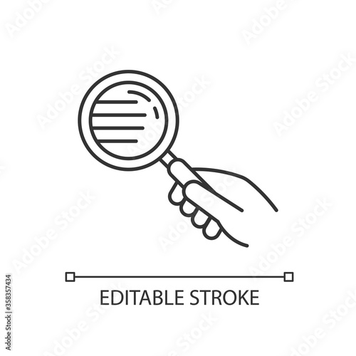 Magnify glass pixel perfect linear icon. Hand with lens. Close inspection. Search for information. Thin line customizable illustration. Contour symbol. Vector isolated outline drawing. Editable stroke