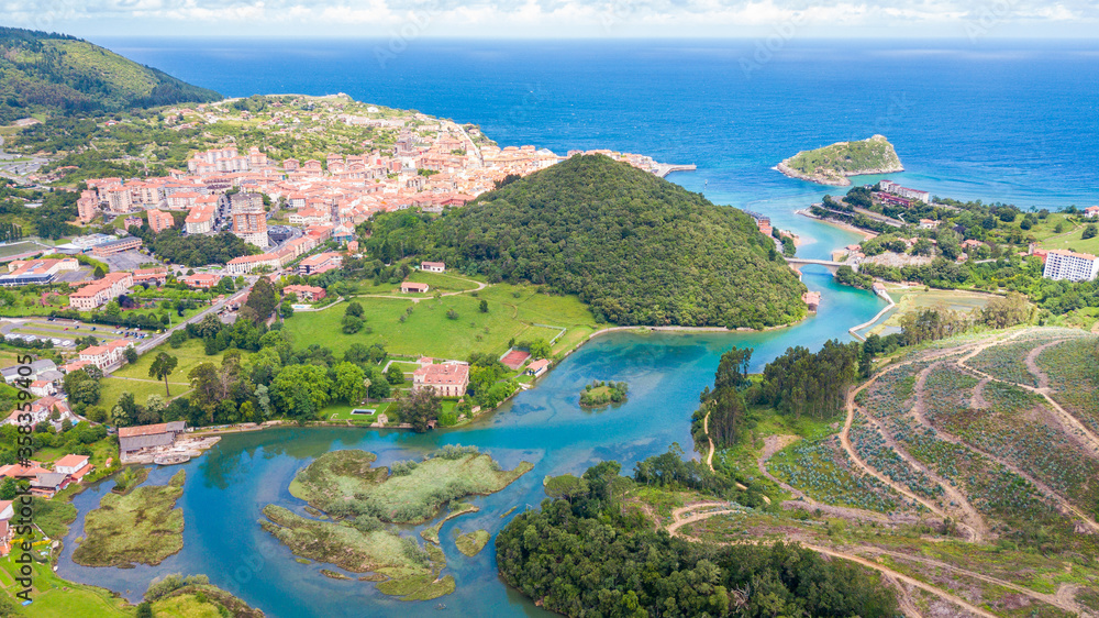 aerial view of lea estuary with lekeitio town at background