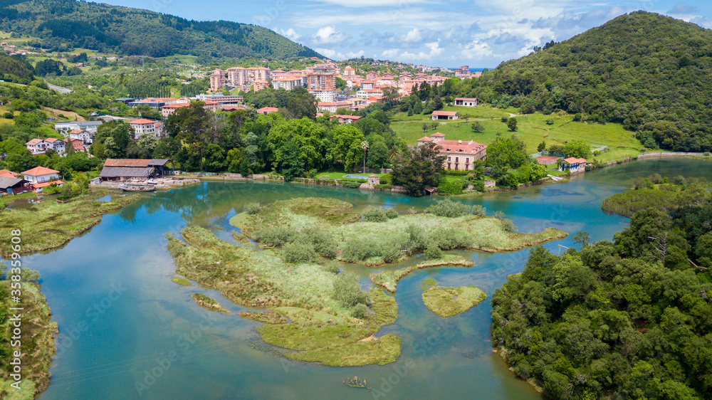 aerial view of lea estuary with lekeitio town at background