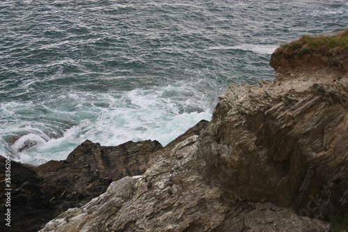 Dangerous waves crashing on rocks