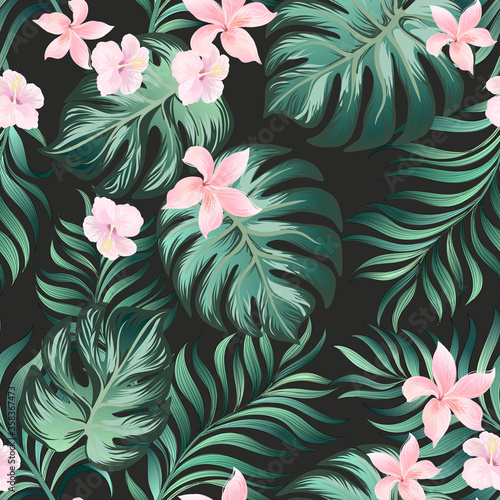 Seamless Trotical pattern with palm leaves and hibiscus flowers. photo