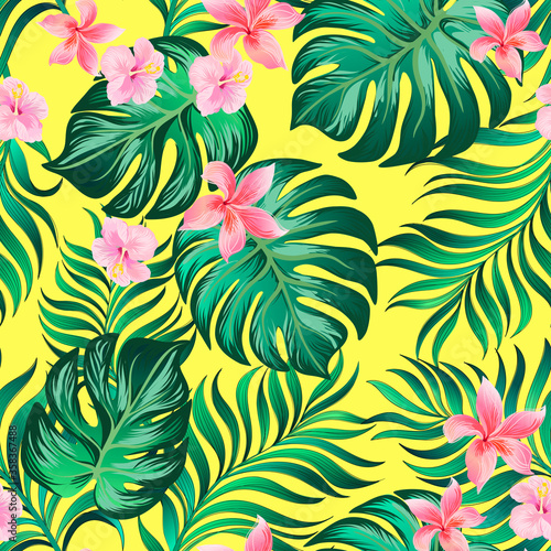 Seamless Trotical pattern with palm leaves and hibiscus flowers. photo