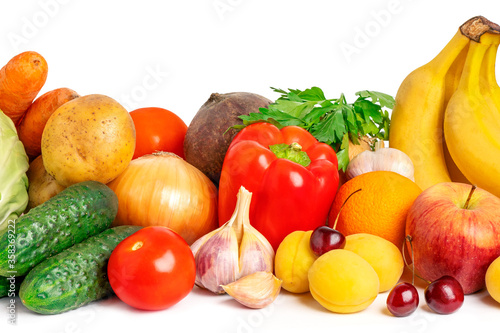 Healthy food background. Vegan organic vegetables and fruits on white. Banner for supermarket.