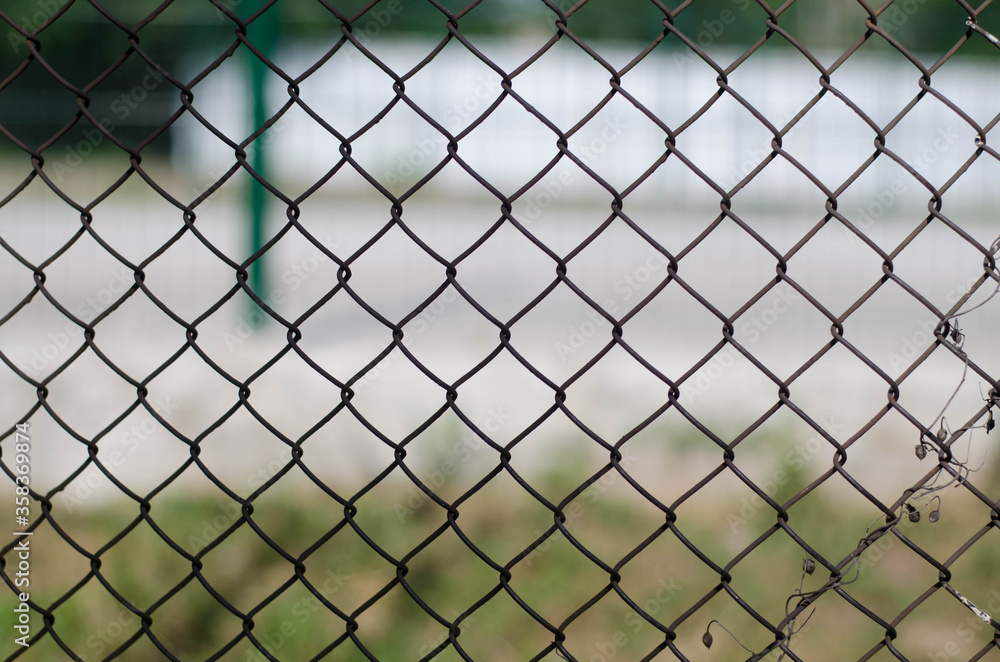 Metal grid. Iron wire. Fence from the net. Metal grid. Iron wire. Fence from the net.