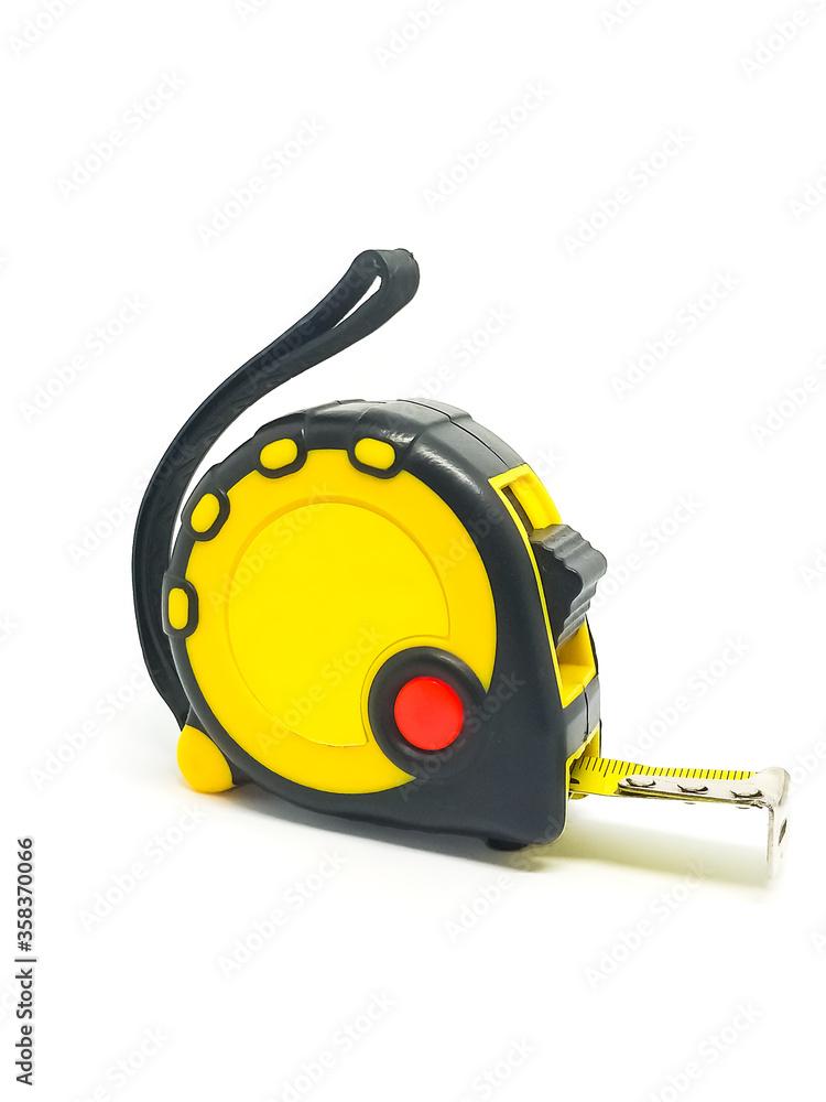 Single yellow and black tape measure isolated on a white background. Place for text, logo Single yellow and black tape measure isolated on a white background. Place for text, logo