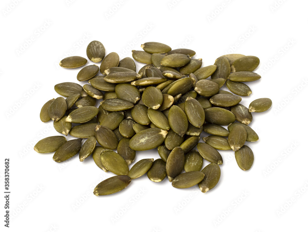 raw pumpkin seeds isolated on a white background. proper nutrition and weight loss raw pumpkin seeds isolated on a white background. proper nutrition and weight loss
