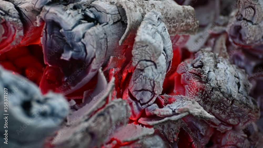 slow smoldering of hot coals on the grill slow smoldering of hot coals on the grill