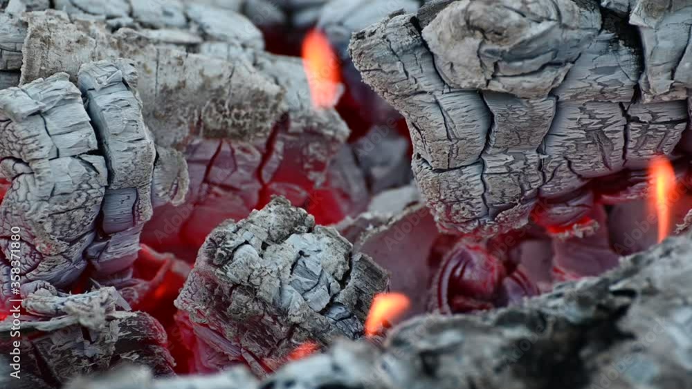 slow smoldering of hot coals on the grill slow smoldering of hot coals on the grill