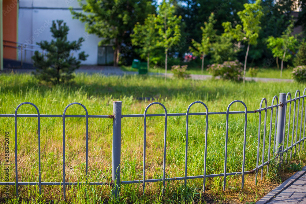 Old abandoned fence on the street Old abandoned fence on the street