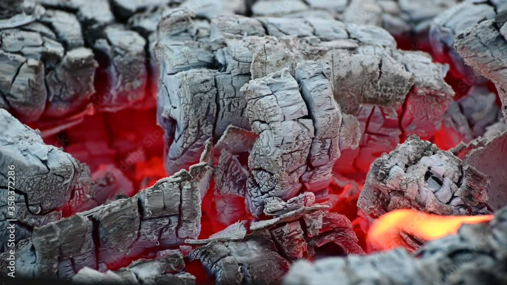 slow smoldering of hot coals on the grill slow smoldering of hot coals on the grill