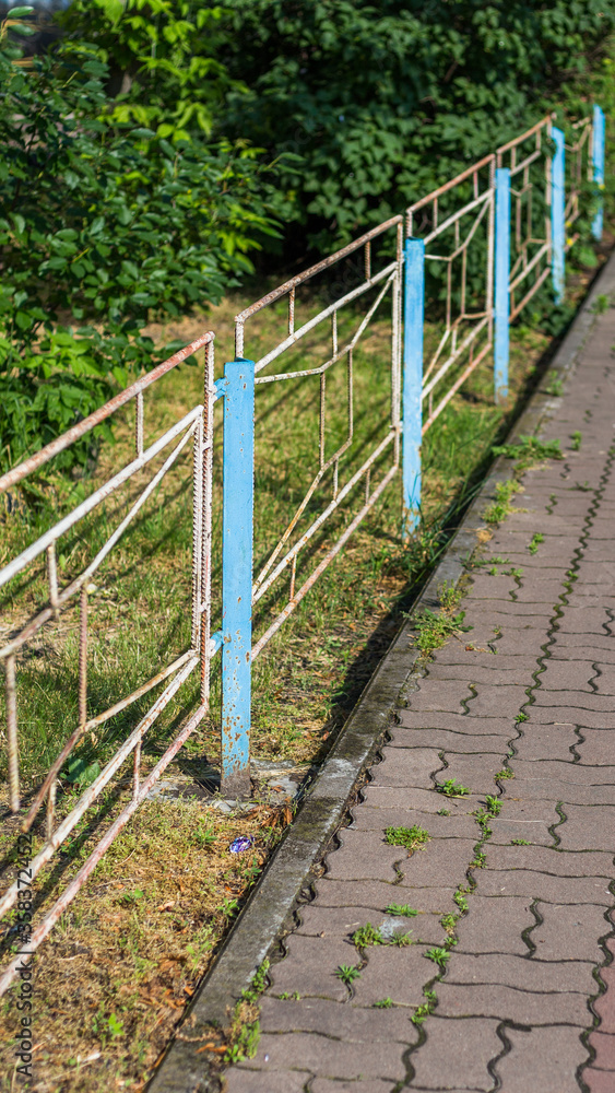Old abandoned fence on the street Old abandoned fence on the street