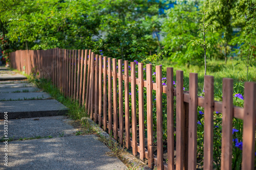 Old abandoned fence on the street