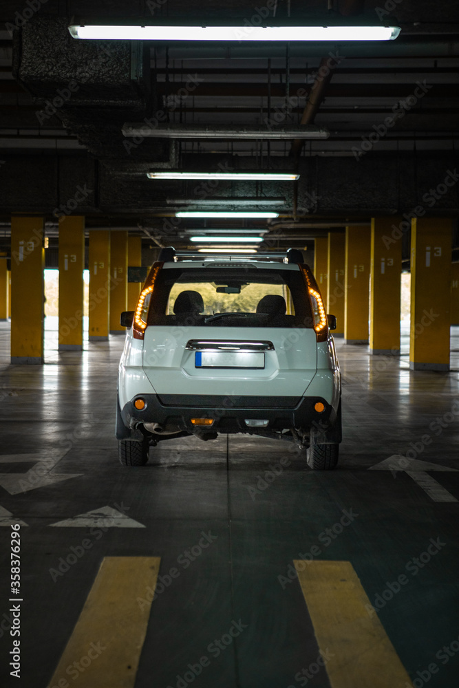 white suv car at underground parking white suv car at underground parking